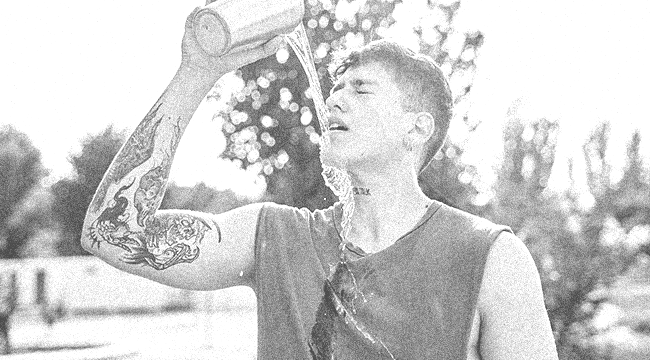 A guy cooling down after a hard workout.