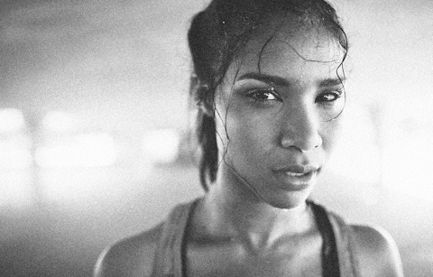 Closeup of a woman sweating from a hard workout
